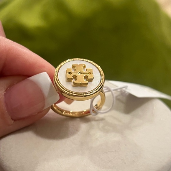 Tory Burch Ring with a mother of pearl and gold logo. - Picture 2 of 4